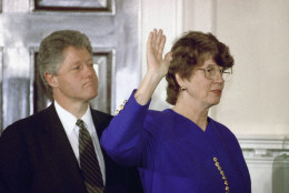 While President Bill Clinton looks on, Janet Reno takes the oath as attorney general during a ceremony at the White House in Washington on March 12, 1993. Supreme Court Justice Byron White administered the oath to Reno who became the nations first female attorney general. (AP Photo/Barry Thumma)