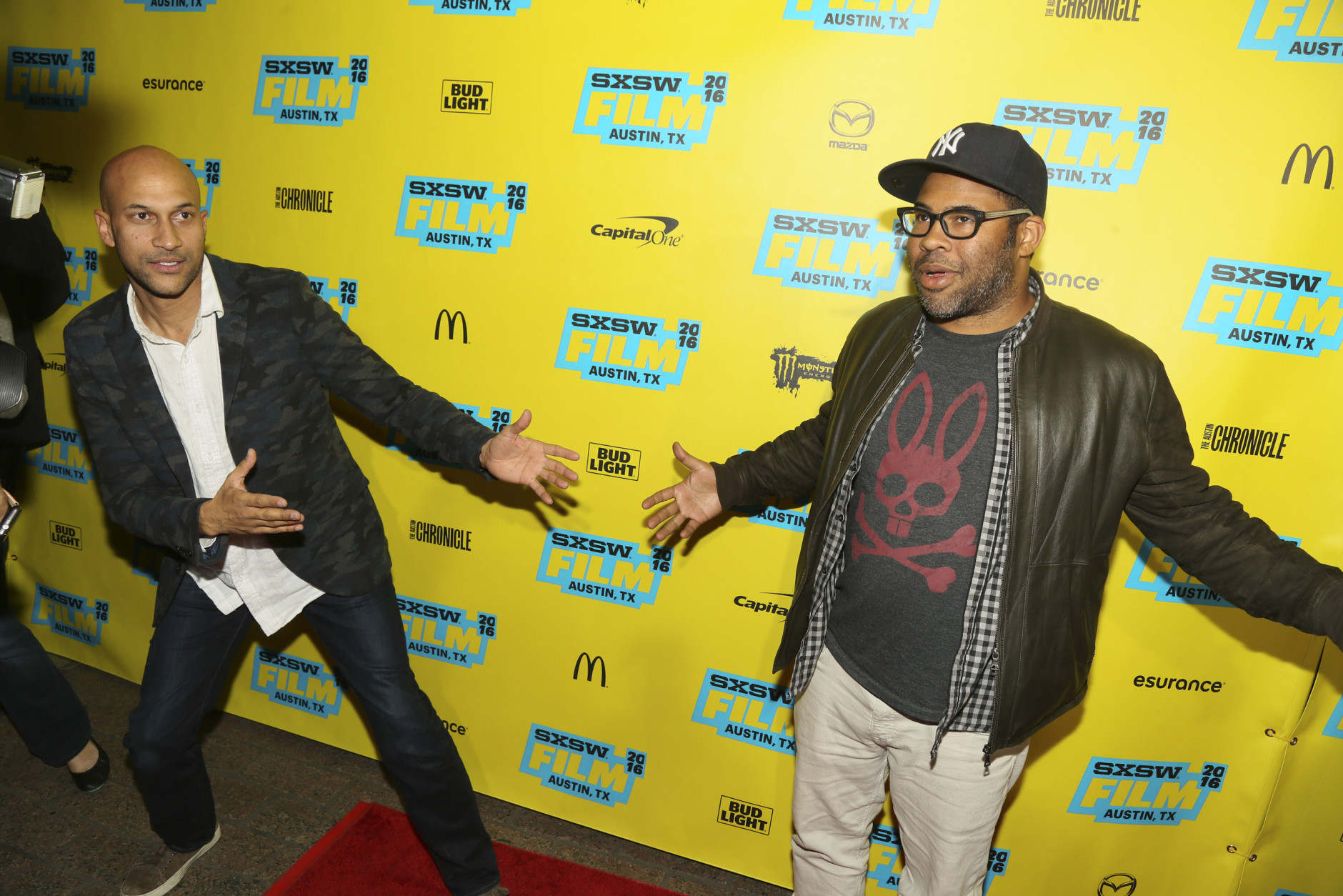 Keegan-Michael Key, left, and Jordan Peele pose at a screening of their work-in-process film "Keanu" at the at the Paramount Theatre during the South by Southwest Film Festival on Sunday, March 13, 2016, in Austin, Texas. (Photo by Jack Plunkett/Invision/AP)