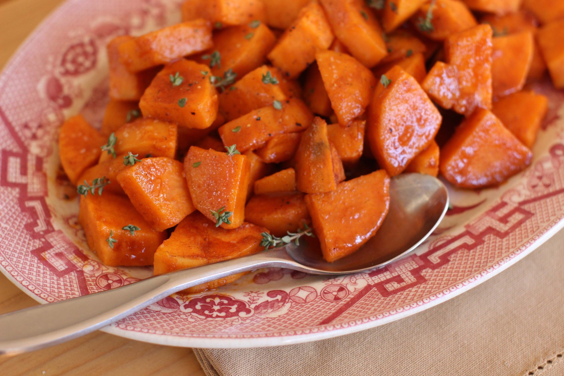 This Oct.  26, 2015 photo shows skillet glazed spicy sweet potatoes in Concord, NH.  No room in the oven, you can cook these delicious glazed sweet potatoes on top of the stove in about 10 minutes flat. (AP Photo/Matthew Mead)