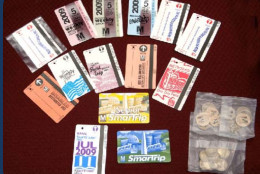A veritable panoply of SmarTrip cards, paper farecards -- even bus tokens. (WMATA)