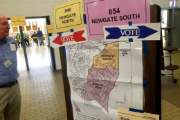 The elections chief at this historically busy Fairfax County polling place says morning turnout was heavy, and that more voters chose a Republican ballot. (WTOP/Neal Augenstein)