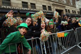 NEW YORK, NY - MARCH 17: People cheer as the during the annual St. Patrick's Day parade, one of the largest and oldest in the world on March 17, 2016 in New York City. Now that a ban on openly gay groups has been dropped, New York Mayor Bill de Blasio is attending the parade for the first time since he became mayor in 2014. The parade goes up Fifth Avenue ending at East 79th Street and will draw an estimated 2 million spectators along its 35-block stretch.  (Photo by Spencer Platt/Getty Images)