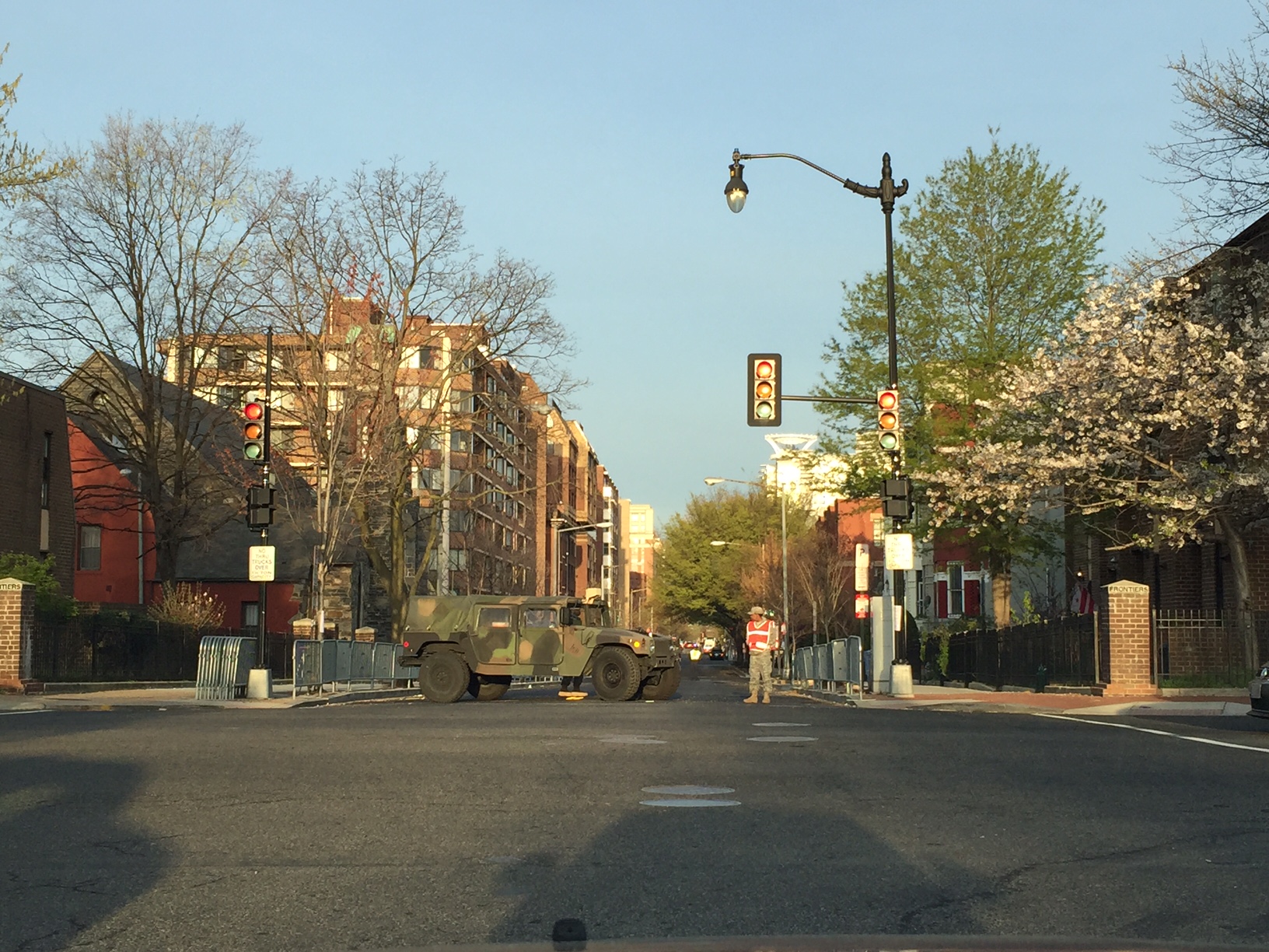 Streets are closing across D.C. in the wake of the Nuclear Security Summit. A military truck blocks the road as barricades are put up along D.C.sidewalks. (WTOP/ Dennis Foley)