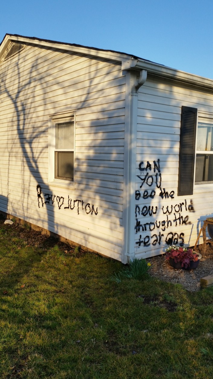 Last week, Beaty says she found her house spray painted with the words “revolution” and “can you see the new world through the tear gas.” 