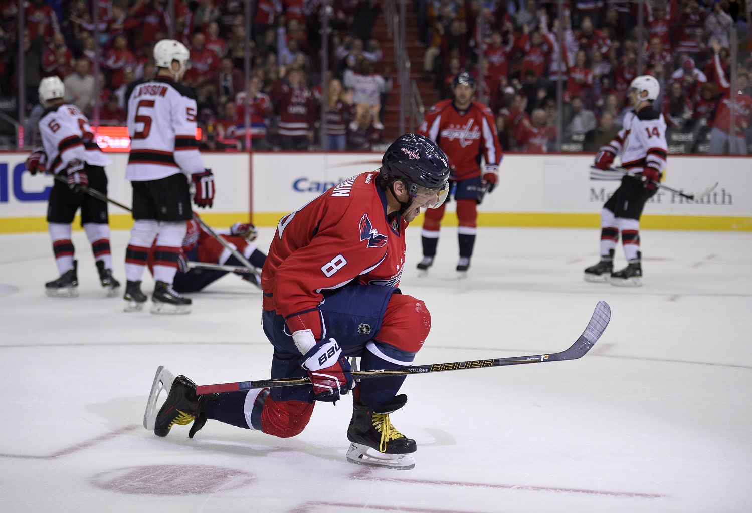Washington Capitals left wing Alex Ovechkin (8), of Russia, celebrates his goal during the first period of an NHL hockey game against the New Jersey Devils, Saturday, Feb. 20, 2016, in Washington. (AP Photo/Nick Wass)