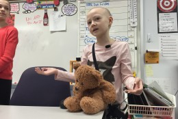 Eleven-year-old Sadie Murata, who's battling a rare form of cancer, returned to class at Laurel Ridge Elementary for the first time in months Tuesday. She was there to encourage fellow students to make bucket lists of short and long term goals. (WTOP/Michelle Basch)