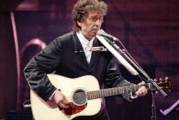 Bob Dylan sings during his anniversary concert at New York's Madison Square Garden, Friday night, Oct. 17, 1992.  Joined by contemporary artists, Dylan celebrates the 30th anniversary of the release of his first Columbia album.  (AP Photo/Ron Frehm)