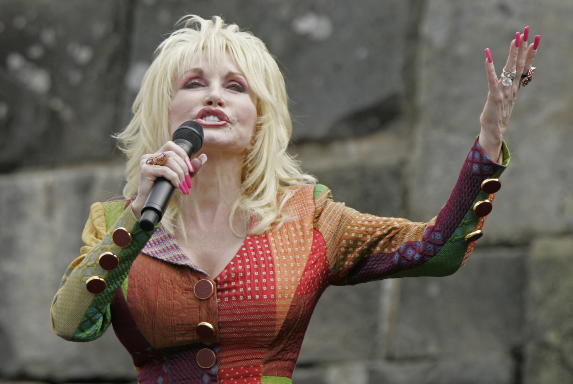 Country music entertainer Dolly Parton performs during the 75th Anniversary Rededication Event at the Rockefeller Memorial at Newfound Gap in the Great Smoky Mountains National Park Wednesday, Sept. 2, 2009 at the Tennessee-North Carolina border. (AP Photo/Wade Payne)
