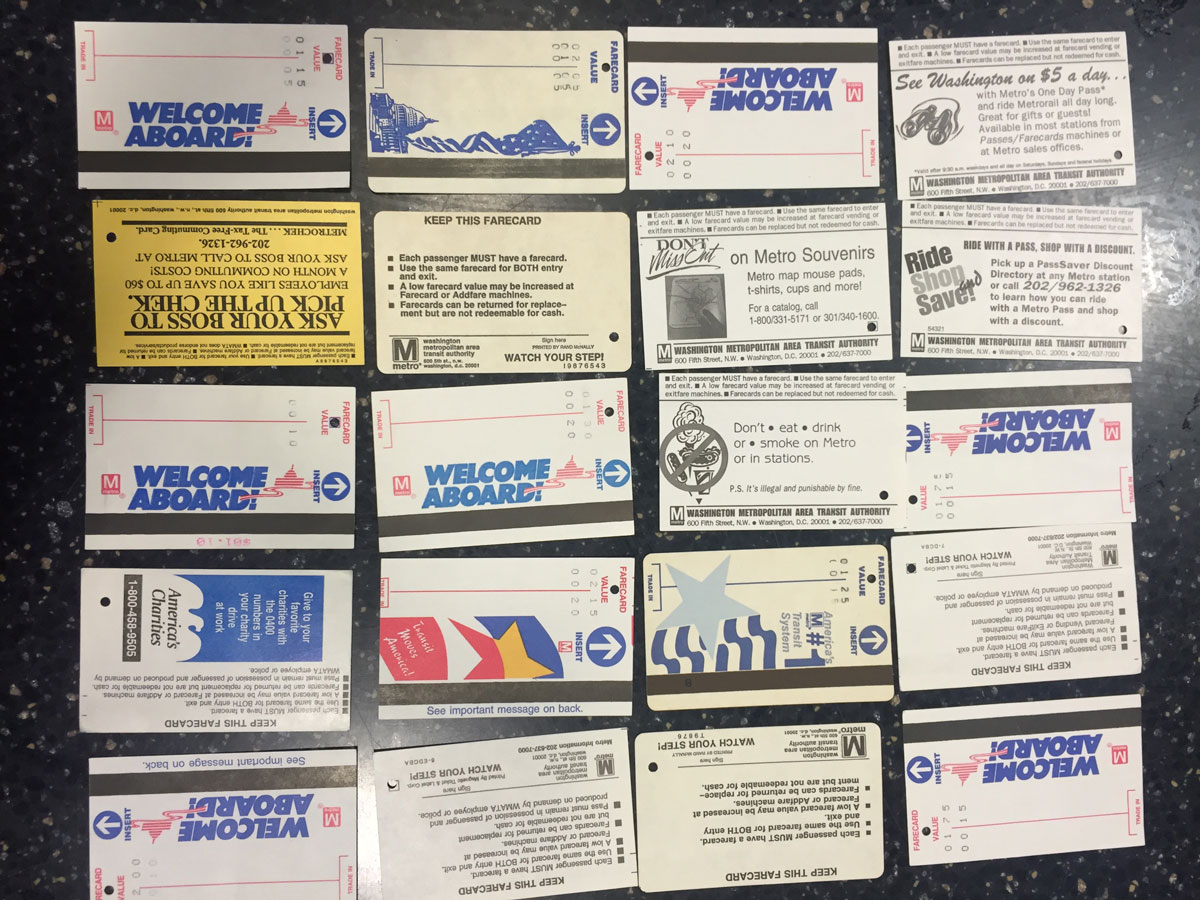 A variety of SmarTrip paper fare cards, including a tax-free commuting card. (WTOP/J.J. Green)
