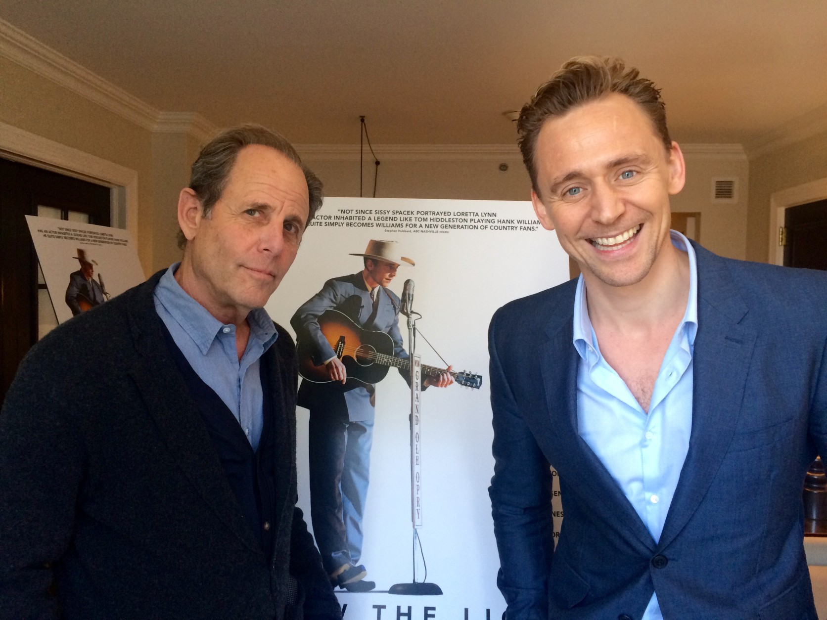 Director Marc Abraham (left) and actor Tom Hiddleston (right) visit Washington D.C. to promote the Hank Williams biopic "I Saw the Light." (WTOP/Jason Fraley)