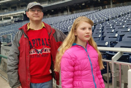 Paul Parfomak and 11-year-old daughter Sofia Parfomak, from Arlington, Virginia at Nats Park for the 9th annual national anthem auditions. (WTOP/Kathy Stewart)