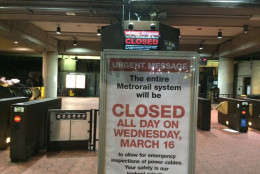 A sign alerting commuters that Washington's Metro subway system will be shutdown for a full day. (WTOP/Nick Iannelli)