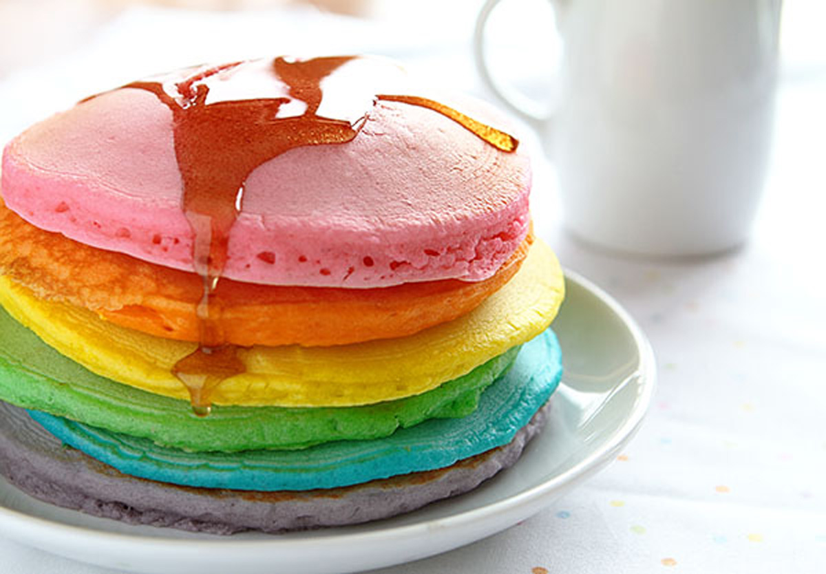 Need something a little more kid-friendly than deviled eggs? Try <a href="http://iambaker.net/perfect-rainbow-pancakes/">I Am Baker</a>’s guide to making old-fashioned pancakes with a little bit of food coloring — transforming the meal into a full rainbow of colors. (Courtesy I Am Baker)