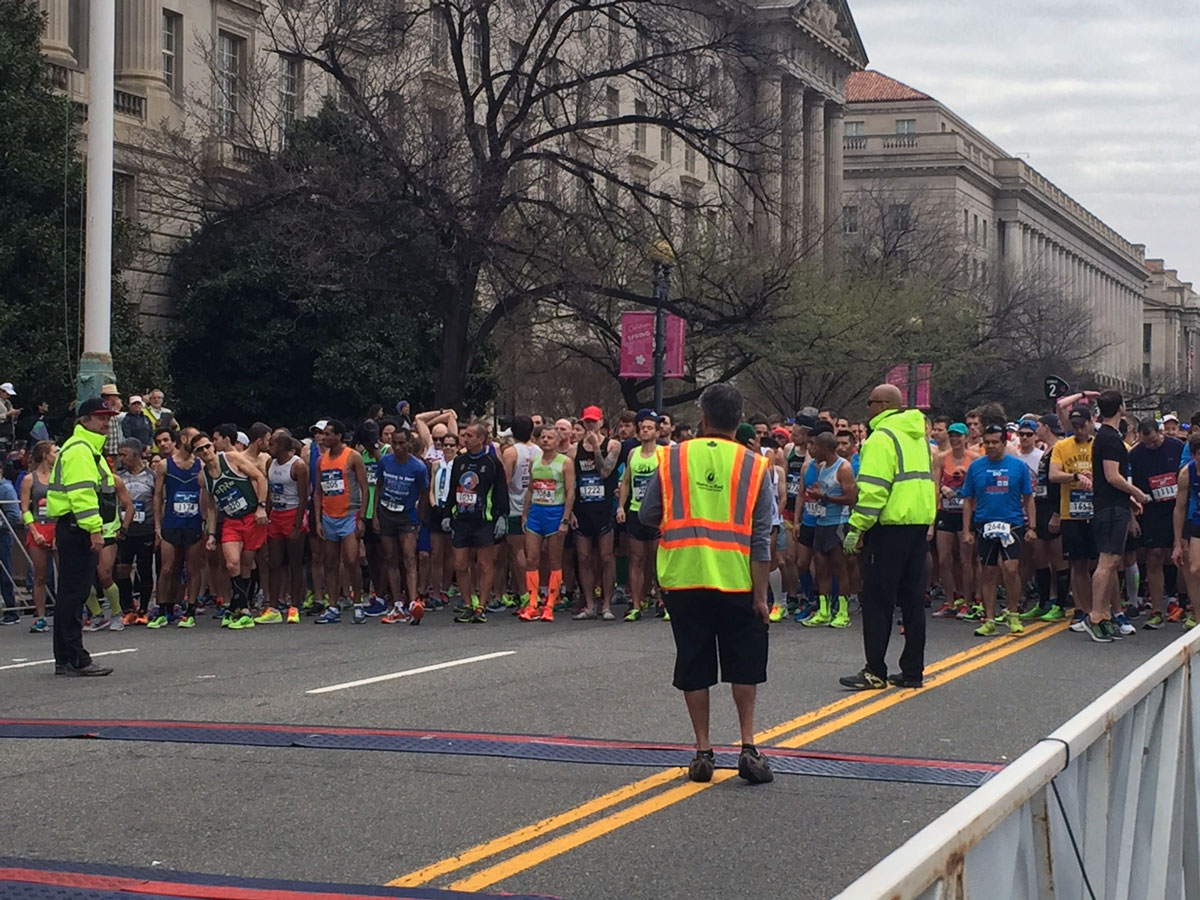 Racers and staff get ready before the start of the Rock ‘n’ Roll Marathon. (WTOP/Dennis Foley)