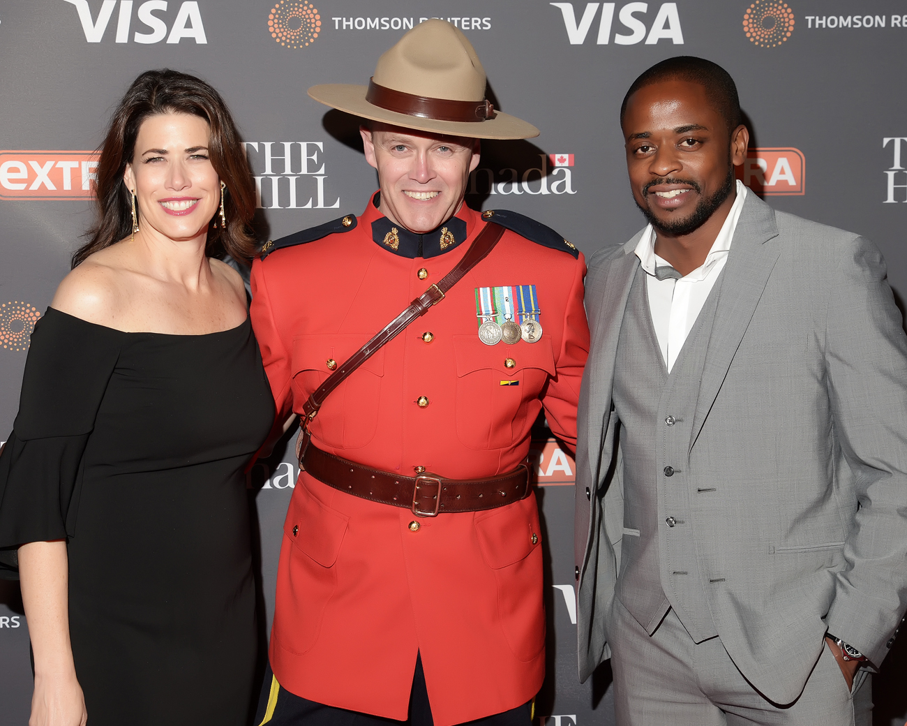 A "West Wing" reunion with actress Melissa Fitzgerald and Dule Hill, joined by Canadian Mountie John Fitzgerald, at  The Hill/Extra/Embassy of Canada WHCD pre-party in Washington D.C. on Friday April 29. (Shannon Finney Photography)
