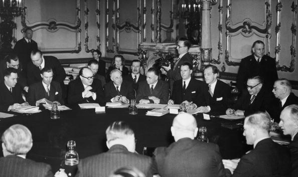 British Foreign Secretary Ernest Bevin (1881 - 1951) meets the Foreign Ministers of France, Belgium, Holland and Luxembourg at Lancaster House in London, to begin talks on the Washington draft of the North Atlantic Treaty, 14th March 1949. A. V. Alexander (1885 - 1965), Britain's Minister of Defence, is on the extreme right, with Mr Bevin on his right. (Photo by Reg Speller/Fox Photos/Hulton Archive/Getty Images)
