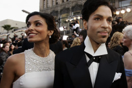 Singer Prince arrives with his wife Manuela Testolini for the 77th Academy Awards Sunday, Feb. 27, 2005, in Los Angeles. Prince will be a presenter during the Oscars telecast.  (AP Photo/Kevork Djansezian)