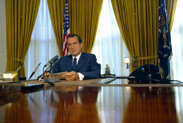 President Richard Nixon is seen in the Oval Office of the White House, 1969.  (AP Photo)