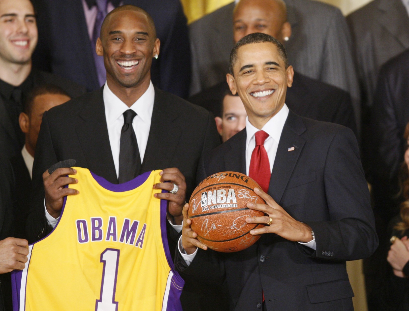 President Barack Obama stands with Los Angeles Lakers guard Kobe Bryant, in the East Room of the White House in Washington, Monday, Jan. 25, 2010, during a ceremony honoring the 2009 NBA basketball champions Los Angeles Lakers. (AP Photo/Charles Dharapak)