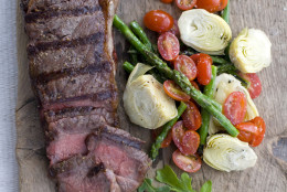 This April 18, 2011 photo shows grilled steak and spring vegetable salad in Concord, N.H. This composed salad of steak and spring vegetables uses the grill to cook and flavor the meat, as well as many of the other components of the dish.   (AP Photo/Matthew Mead)