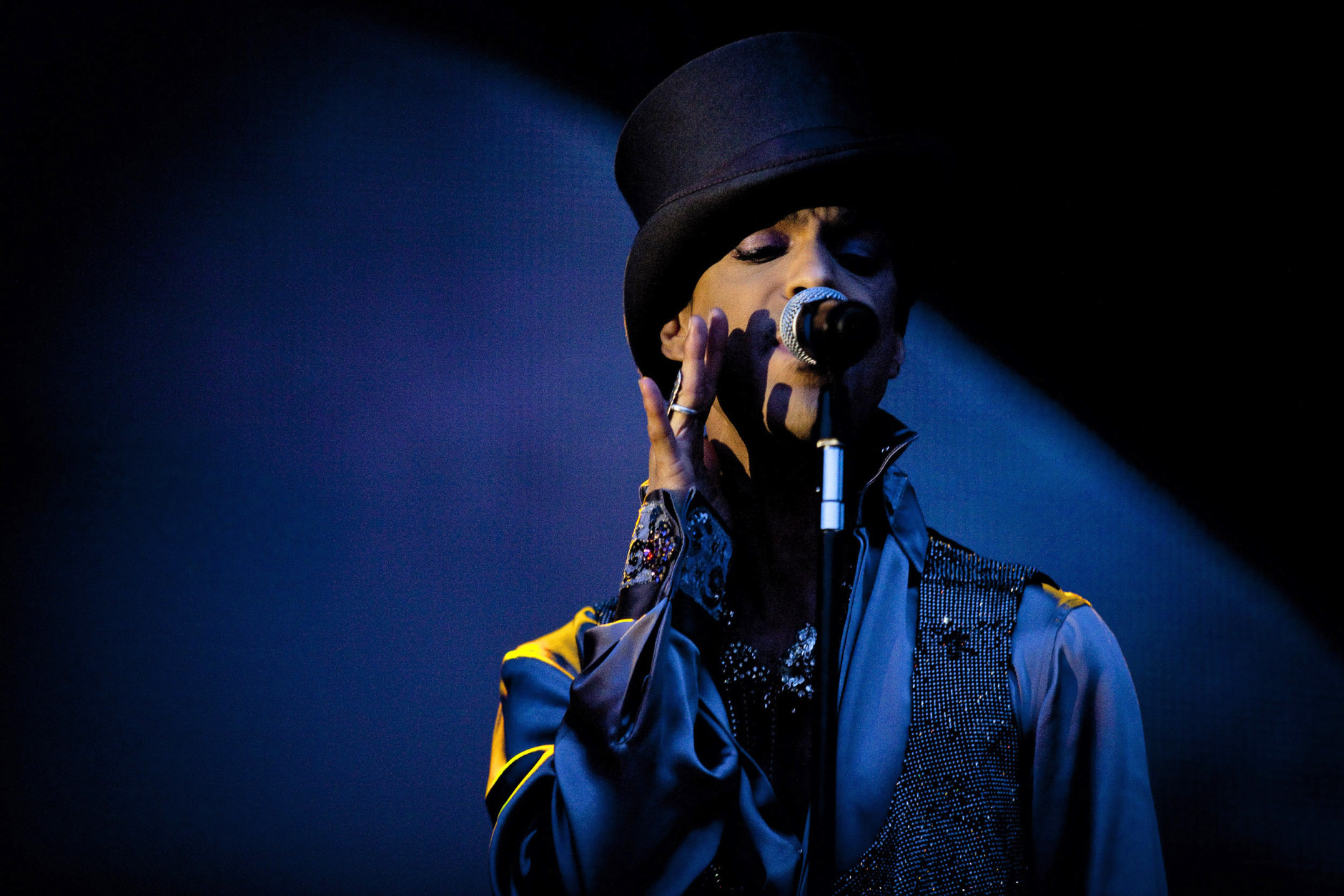 In this Saturday evening, Aug. 6 2011 photo American singer and songwriter Prince performs on the Isle of Amager in Copenhagen, Denmark. The concert was the first of two and it was interupted by heavy rain. (AP Photo/Polfoto/Jakob Joergensen) DENMARK OUT