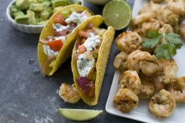This May 30, 2012 image shows a recipe for grilled shrimp tacos in Concord, N.H. (AP Photo/Matthew Mead)