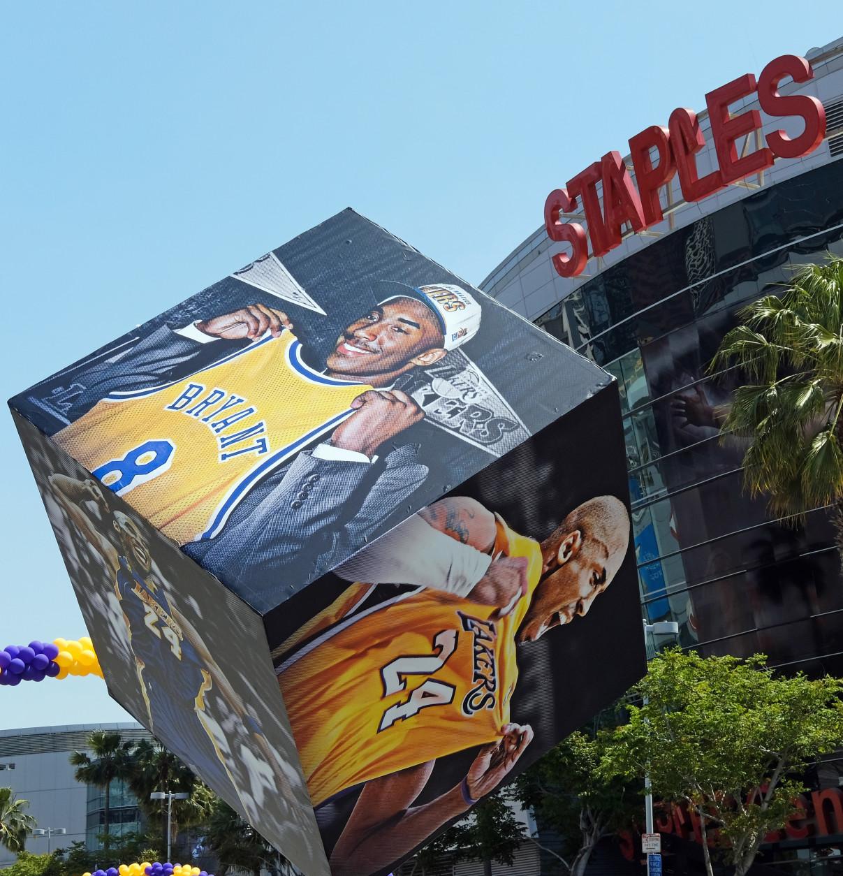 Giant displays commemorating Kobe Bryant's career have been added outside Staples Center before his last NBA basketball game, a contest against the Utah Jazz, in downtown Los Angeles Wednesday, April 13, 2016.  Many of Bryant's fans - even some of the adults - have never known Los Angeles without him. I's a feeling they're about to have to get used to as fans celebrate his final night as a Laker. (AP Photo/Richard Vogel)