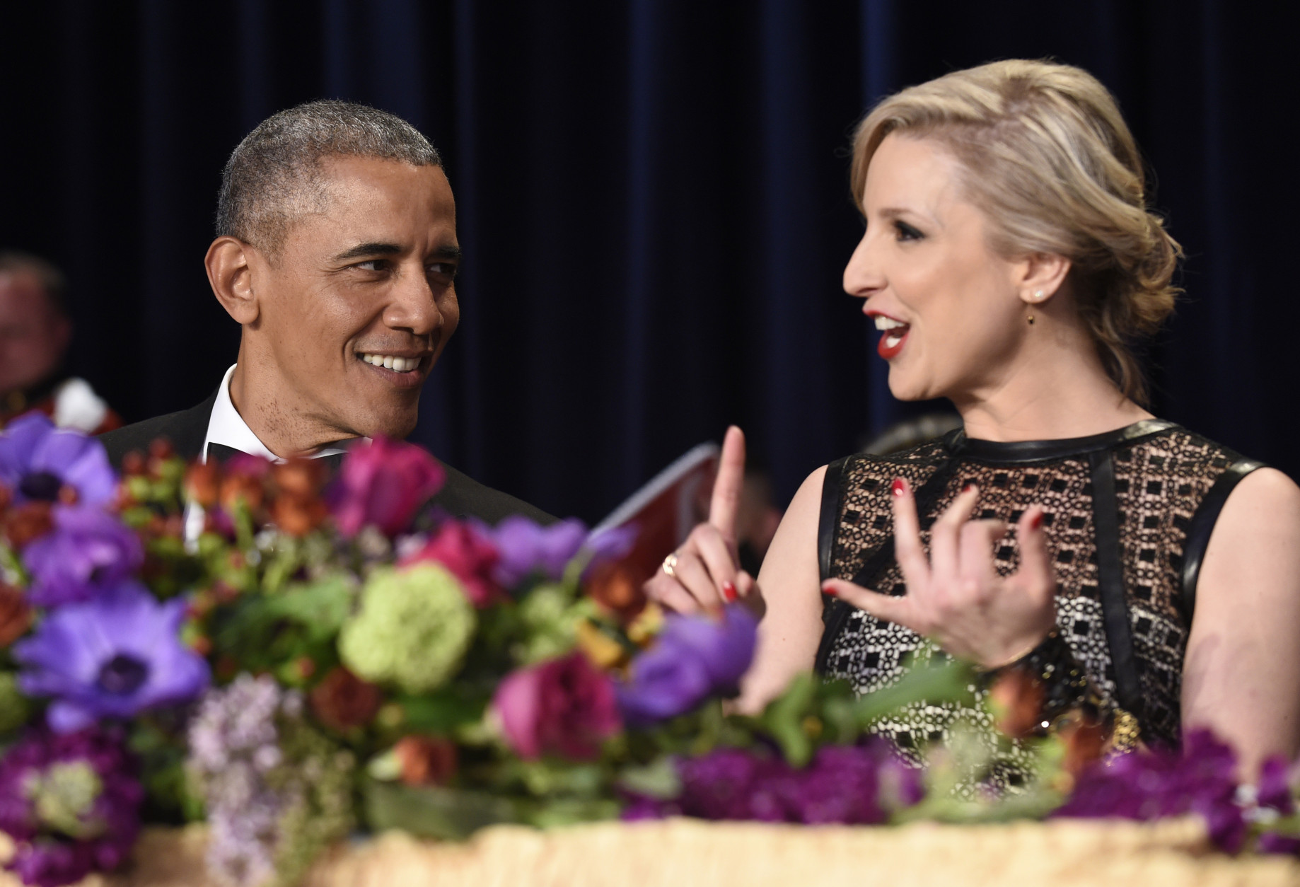 President Barack Obama, left, talks with Carol Lee, right, of The Wall Street Journal, at the annual White House Correspondents' Association dinner at the Washington Hilton in Washington, Saturday, April 30, 2016. (AP Photo/Susan Walsh)