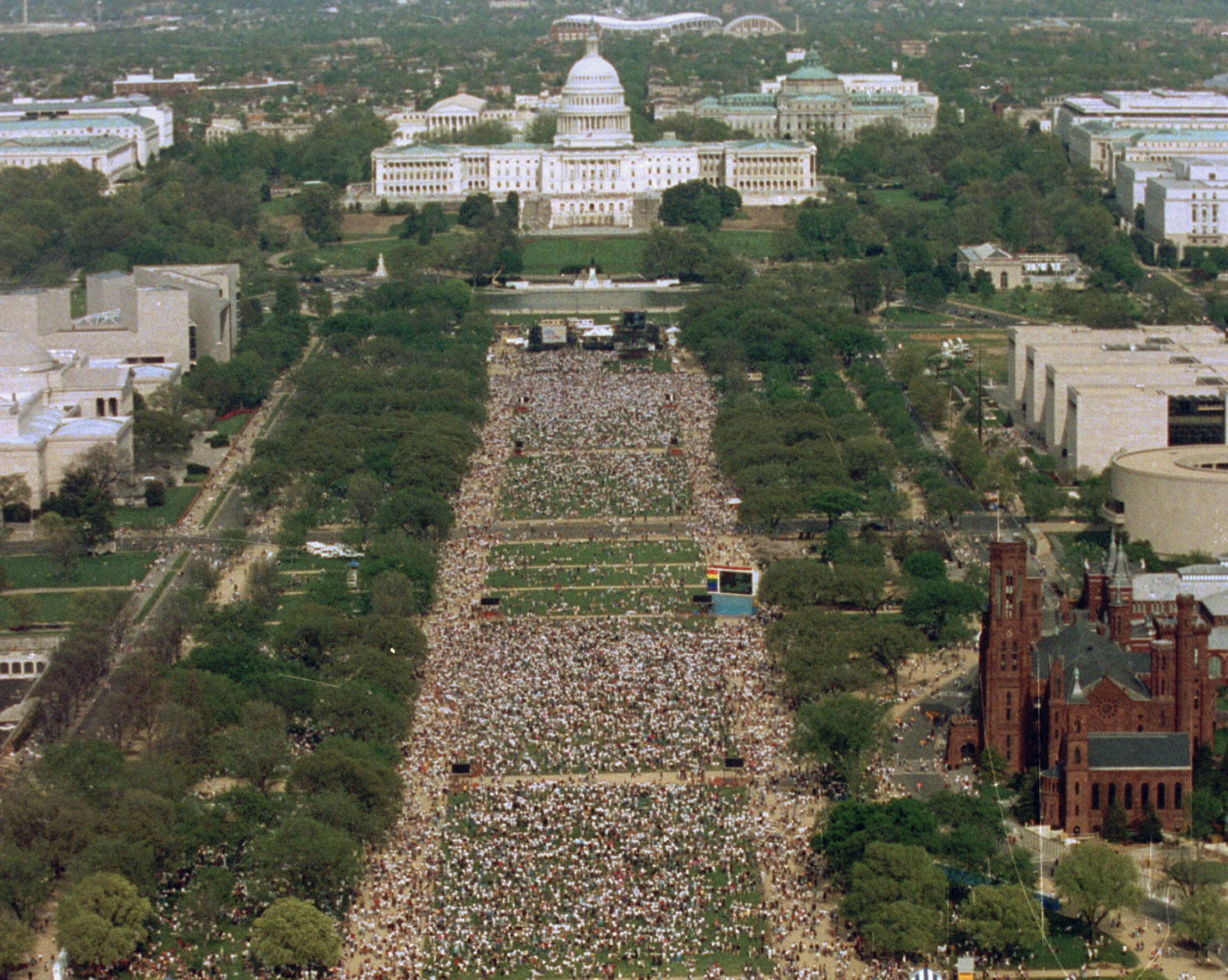 FILE - In this April 25, 1993, file photo, this view from atop the Washington Monument shows people gathered for the National March on Washington for Gay and Lesbian Rights in Washington. (AP Photo/Mark Wilson, File)