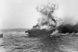The USS Lexington, U.S. Navy aircraft carrier, explodes after being bombed by Japanese planes in the Battle of the Coral Sea in the South Pacific in June 1942, during World War II.  (AP Photo)
