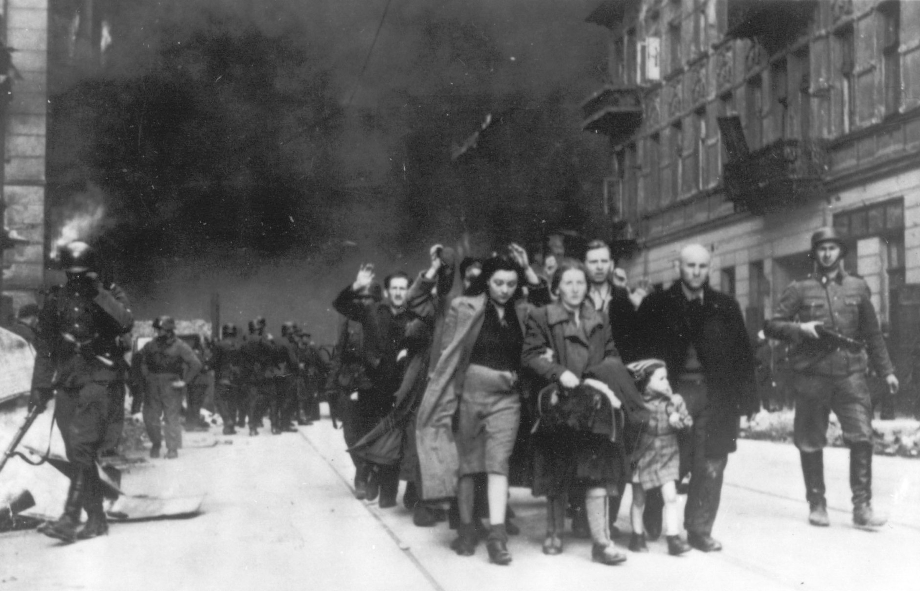 ** FILE ** In this 1943 file photo, a group of Polish Jews are led away for deportation by German SS soldiers, in April/May 1943, during the destruction of the Warsaw Ghetto by German troops after an uprising in the Jewish quarter. The family of Polish social worker Irena Sendler who is credited with rescuing 2,500 Jewish children from the Nazis during the Holocaust says she has died. Sendler's daughter, Janina Zgrzembska, says her 98-year-old mother died Monday, May 12, 2008, morning in a Warsaw hospital. Sendler organized the rescue of Jewish children from the Warsaw Ghetto during Nazi Germany's brutal World War II occupation. (AP Photo)