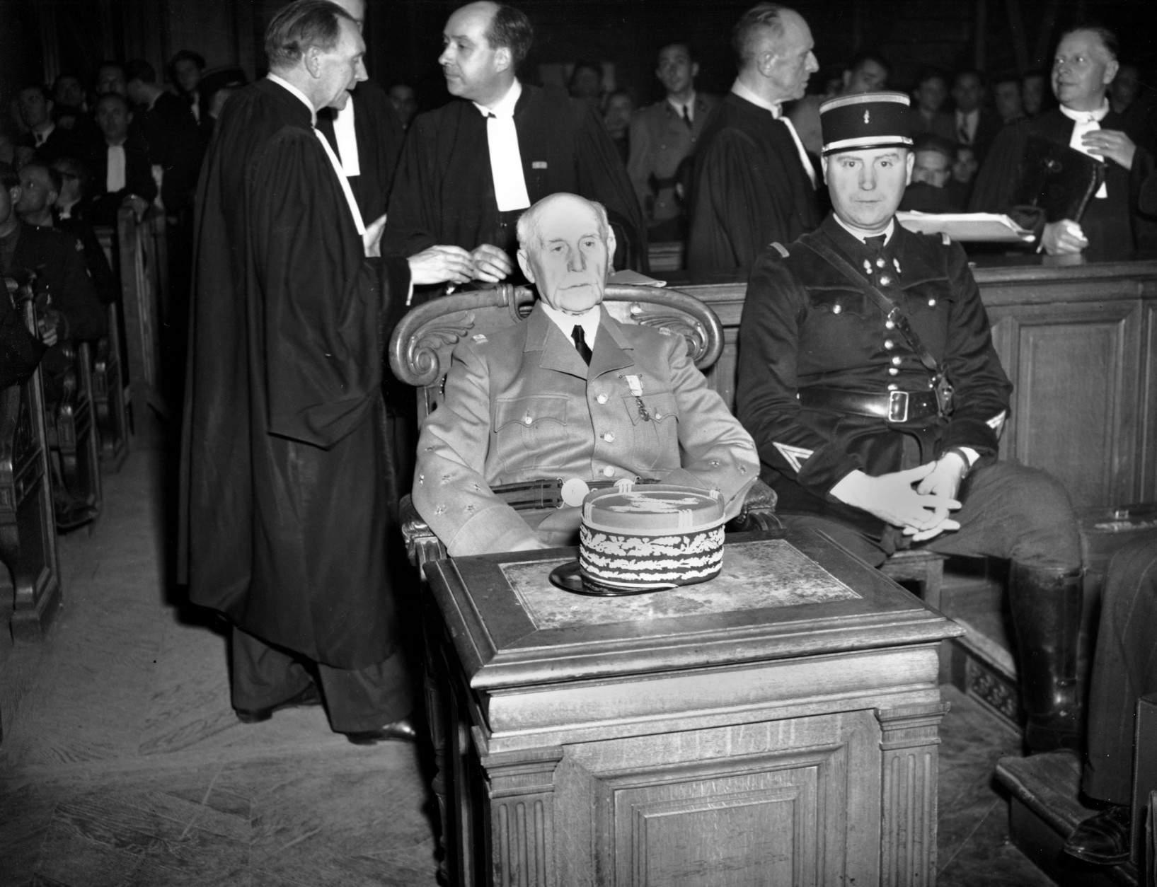 French Marshal Henri Philippe Petain sits in court as his trial opened in Paris, France on July 23, 1945.  (AP Photo/Carroll)