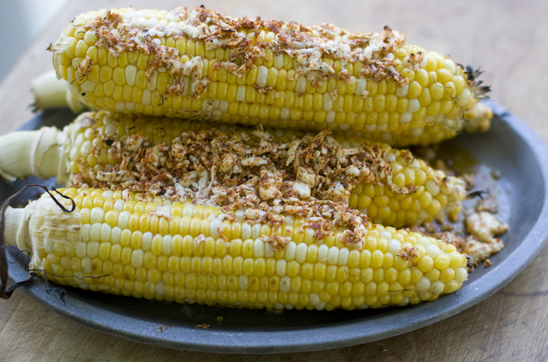 This July 15, 2013 photo shows grilled corn with queso fresco in Concord, N.H. (AP Photo/Matthew Mead)