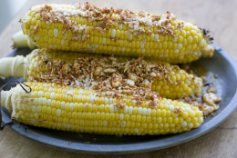 This July 15, 2013 photo shows grilled corn with queso fresco in Concord, N.H. (AP Photo/Matthew Mead)