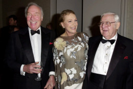 FILE - In this April 25, 2001 file photo, Julie Andrews, center, is joined by Christopher Plummer, left,  her co-star from the film "The Sound of Music," and the film's director, Robert Wise, during a reception for the event where Andrews received the ELLA award in Beverly Hills, Calif. The 1965 Oscar-winning film adaptation of the Rodgers &amp; Hammerstein musical "The Sound of Music" is celebrating its 50th birthday in 2015. To honor the milestone, 20th Century Fox is releasing a five-disc Blu-ray/DVD/Digital HD collector's edition, the soundtrack is being re-released, the film will be screened at the TCM Classic Film Festival in Hollywood later this month and to over 500 movie theaters in April 2015. (AP Photo/Kevork Djansezian, File)