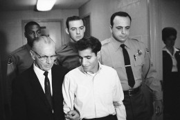 Sirhan Bishara Sirhan is escorted by his attorney, Russell E. Parsons from Los Angeles county jail chapel to enter plea to charge of murder, June 28, 1968. (AP Photo/George Brich)