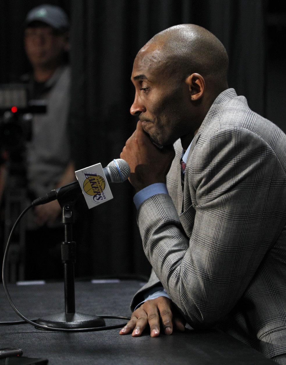 Los Angeles Lakers forward Kobe Bryant reflects at news conference on why he decided to announce his retirement prior to an NBA basketball game against the Indiana Pacers in Los Angeles, Sunday, Nov. 29, 2015. The Pacers won 107-103. (AP Photo/Alex Gallardo)
