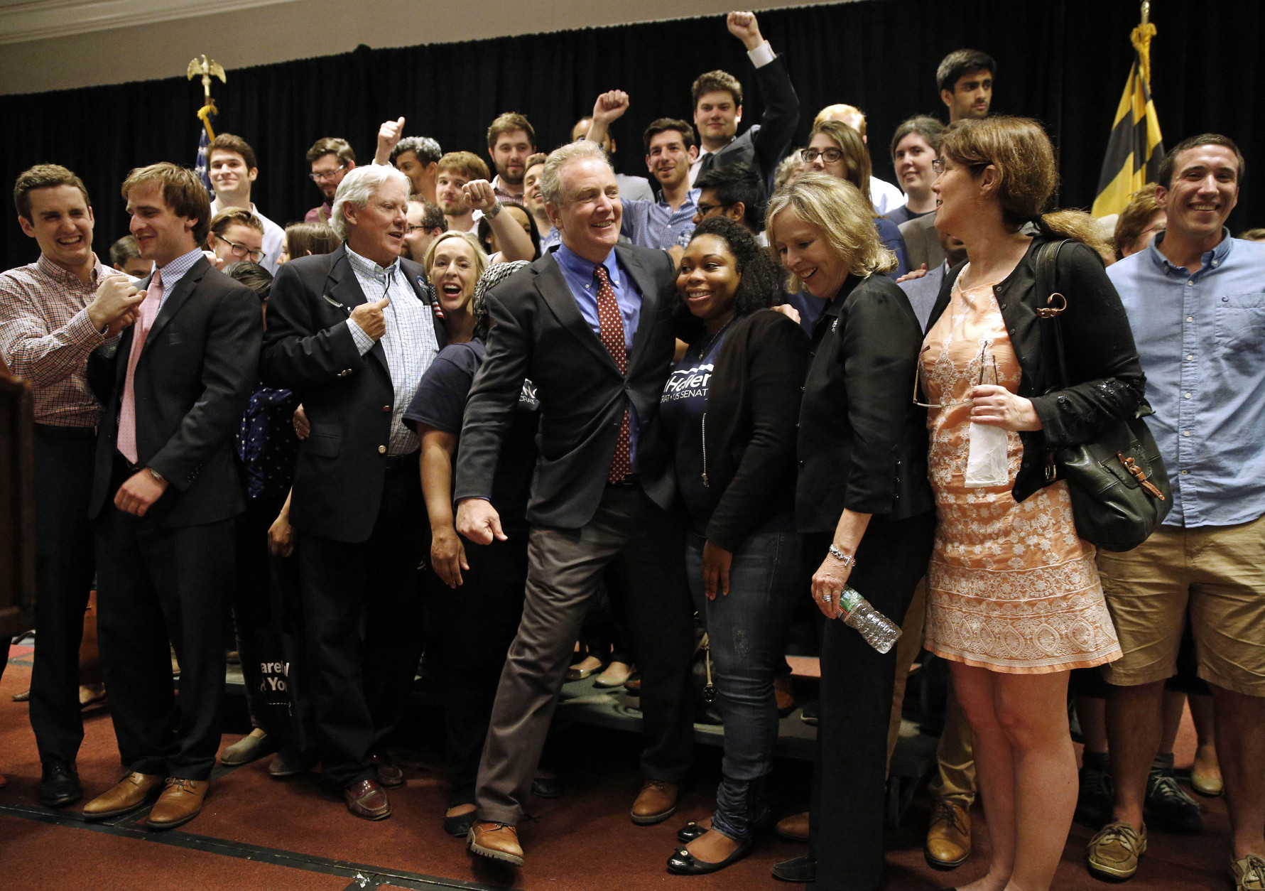 Democratic U.S. Senate candidate, Rep. Chris Van Hollen, D-Md., center, celebrates with campaign staff and volunteers after an election night party in Bethesda, Md., Tuesday, April 26, 2016. Van Hollen defeated Rep. Donna Edwards, D-Md., in the Democratic primary for U.S. Senate. (AP Photo/Patrick Semansky)