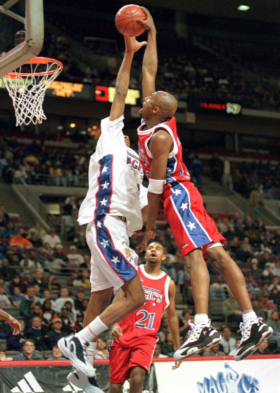 Kobe Bryant playing for the East team in  Magic's Roundball Classic at The Palace of Auburn Hills, Mich., shoots over the West teams Jamaal Magliore.  Both high school seniors, Bryant from Wynnewood, Penn., who attends Lower Merion High School and Magliore of Willowdale, Ontario, who attends Eastern High School of Commerce are undecided on the college they are going to next year. (AP Photo/Jeff Kowalsky)