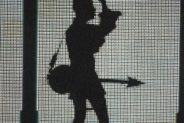 The artist formally known as Prince, silhouetted with his guitar in front of a large television screen, performs ?Holly River? at the ?4th annual VH1 Honors? on Thursday, April 10, 1997 in Universal City, Calif. (AP Photo/Mark J. Terrill)