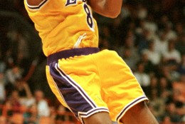 Kobe Bryant of the Los Angeles Lakers goes in for a layup against the Utah Jazz during the second half of their playoff game Thursday, May 8, 1997, in Inglewood, Calif.  The Lakers won 104-84. (AP Photo/Chris Pizzello)