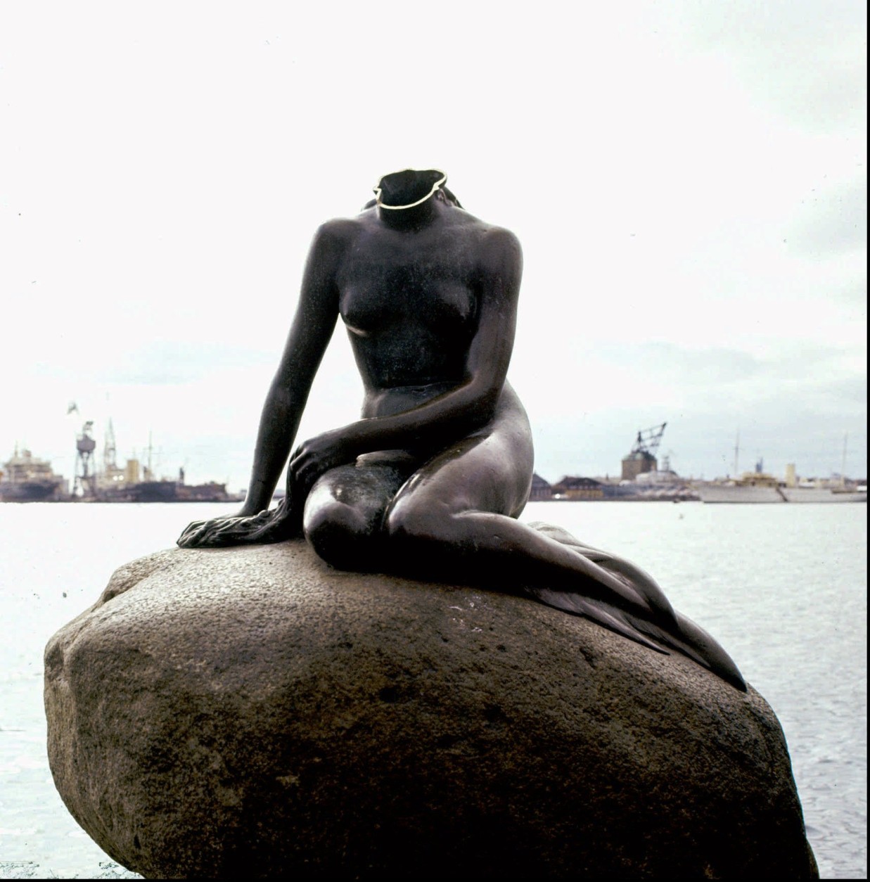 FILE-A Danish artist Henrik Bruun, who recently died, has claimed he was the one who decaptitated Copenhagens famed landmark, the Little Mermaid, in 1964, a news report said Tuesday October 28, 1997. In the years that followed the beheading which caught world attention, some 200 people have confessed to the crime, including a group of Cadian soldiers. Suspects were questioned by the homicide squad. But neither the attackers nor the head of the bronze statue created in tribute to Danish storyteller HansChristian Andersen, were ever found. A new head was cast from the original mold.  (AP Photo/Bjarne Luethke)
