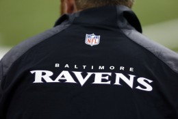A Baltimore Ravens logo is seen on a jacket before an NFL preseason football game against the New Orleans Saints in New Orleans, Thursday, Aug. 28, 2014. (AP Photo/Rogelio Solis)