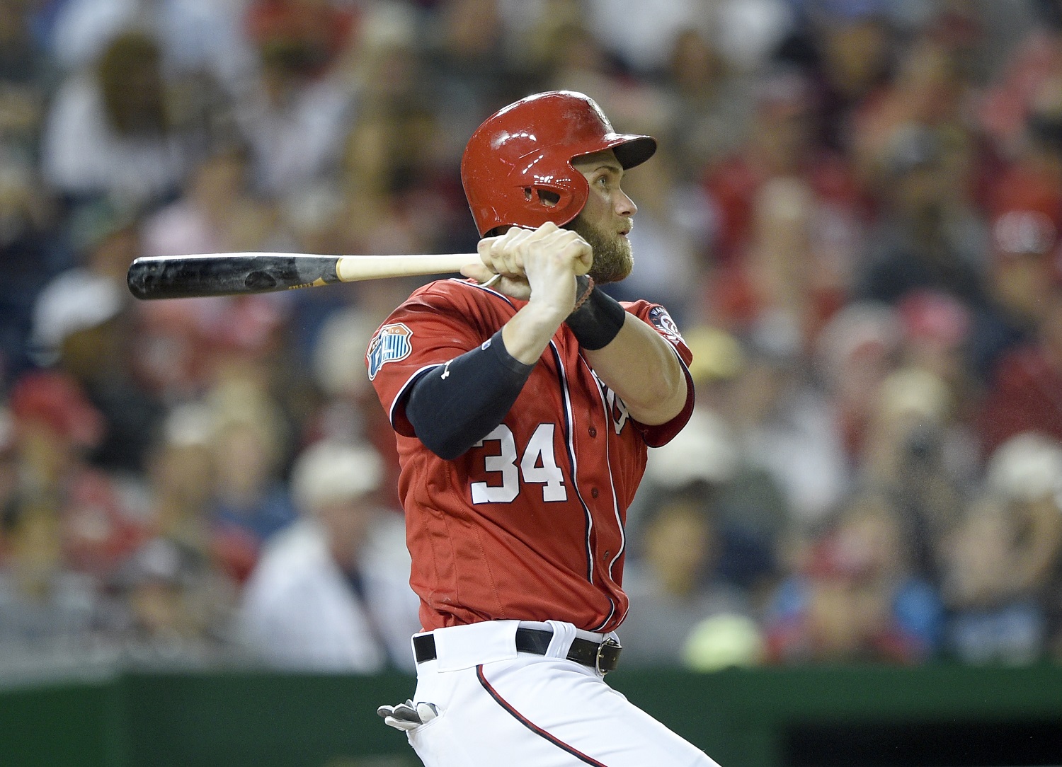 RETRANSMISSION TO CORRECT CITY TO WASHINGTON - Washington Nationals' Bryce Harper doubles during the fifth inning of an interleague exhibition baseball game against the Minnesota Twins, Friday, April 1, 2016, in Washington. The Nationals won 4-3. (AP Photo/Nick Wass)