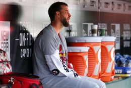 St. Louis Cardinals starting pitcher Adam Wainwright (50) sits in the dugout before the start of an opening day baseball game against the Pittsburgh Pirates at PNC Park in Pittsburgh, Sunday, April 3, 2016. The Pirates won 4-1, with Wainwright taking the loss. (AP Photo/Gene J. Puskar)