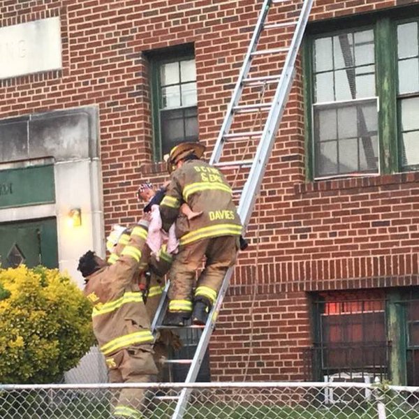 Mom, little girl rescued from burning D.C. apartment (Photos)