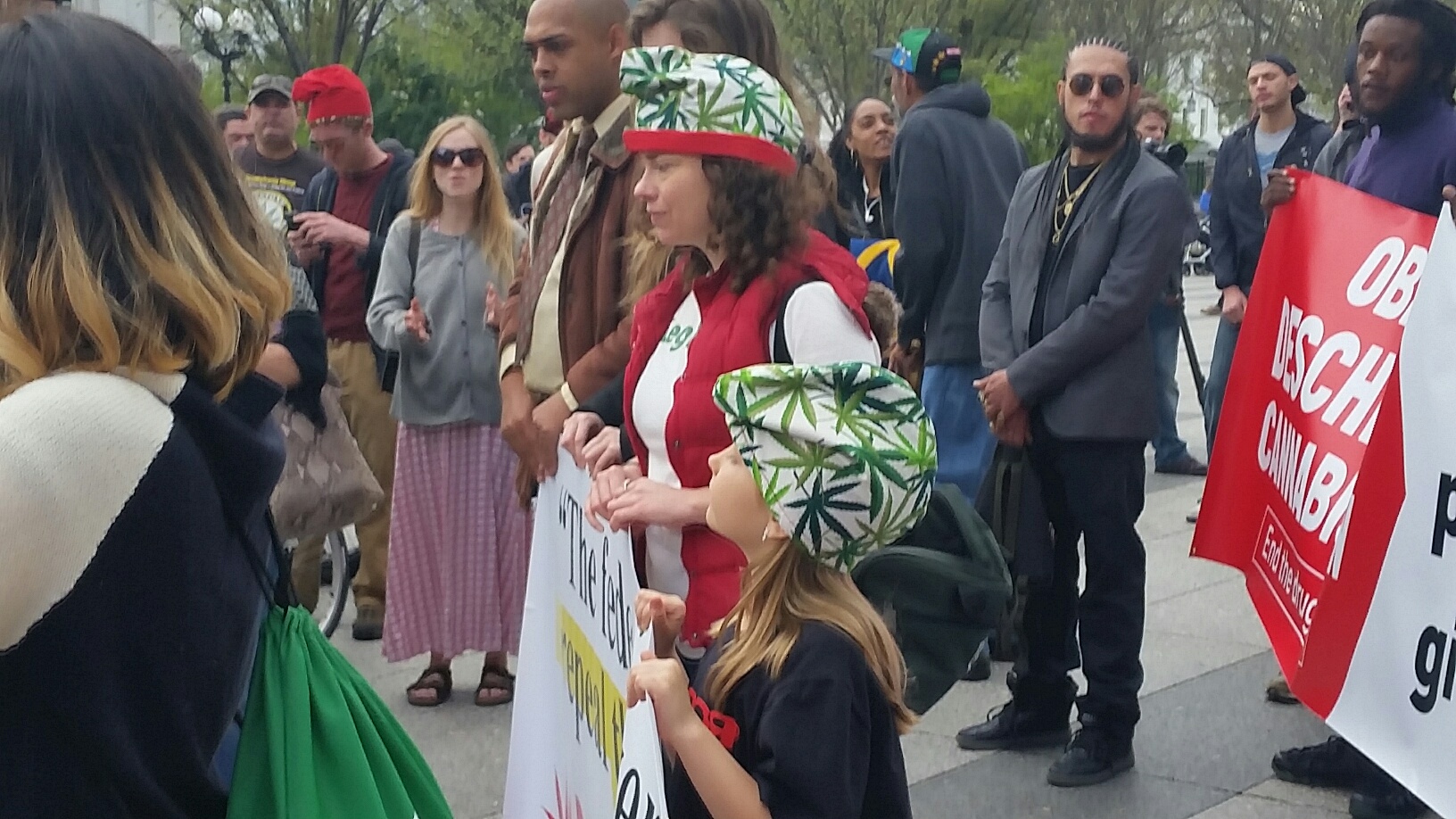 This is the scene from a protest outside the White House on Saturday, March 2, 2016. Pro-marijuana activists say President Barack Obama should remove pot from the list of Schedule 1 controlled substances, which includes heroin and other addictive drugs. (WTOP/Kathy Stewart)