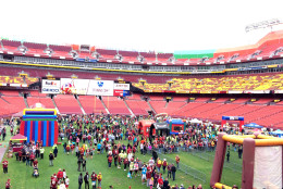 Redskins fans flock to FedExField for the team's Draft Day Party on Saturday, April 30, 2016. (WTOP/Dick Uliano)