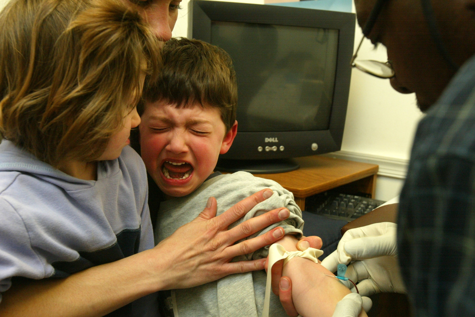 In 2004, four-year-old Nic Cappella cries as a blood sample is drawn.  (Photo by Alex Wong/Getty Images)