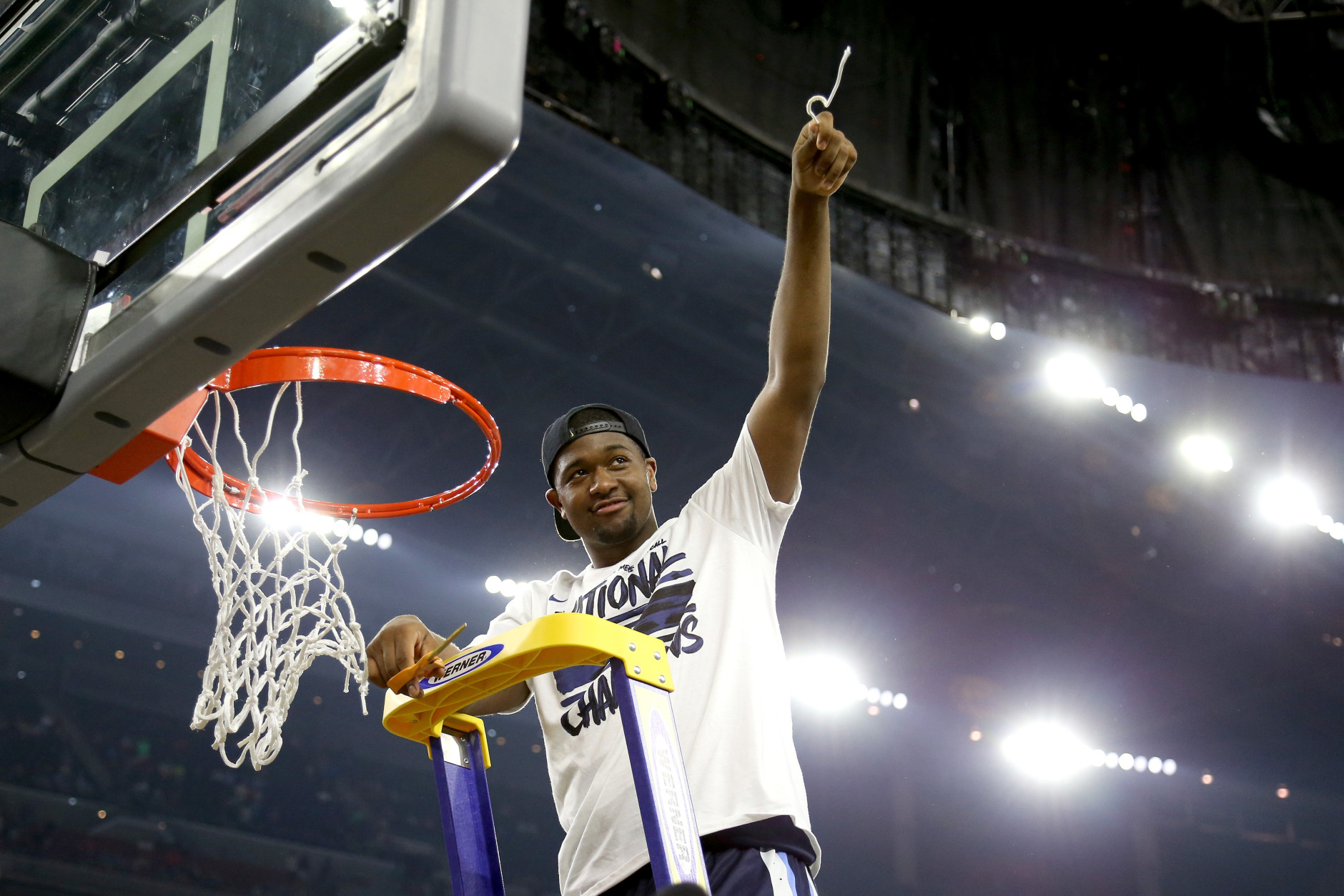 HOUSTON, TEXAS - APRIL 04:  Kris Jenkins #2 of the Villanova Wildcats cuts the net after defeating the North Carolina Tar Heels 77-74 to win the 2016 NCAA Men's Final Four National Championship game at NRG Stadium on April 4, 2016 in Houston, Texas.  (Photo by Streeter Lecka/Getty Images)
